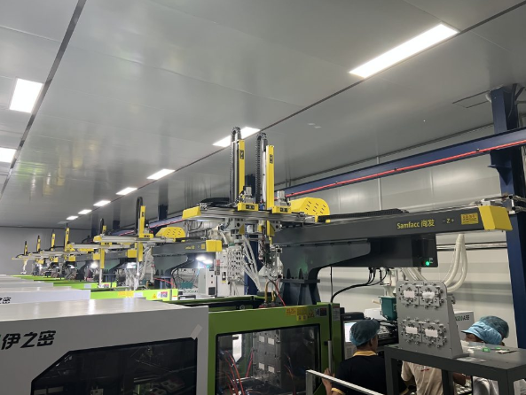 Counting the Benefits of Automation for a Vertical Injection Molding Machine